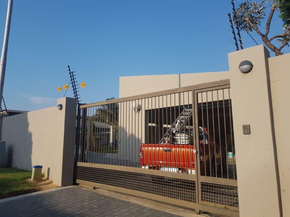 Electric fence above a sliding gate at a residential complex in Johannesburg